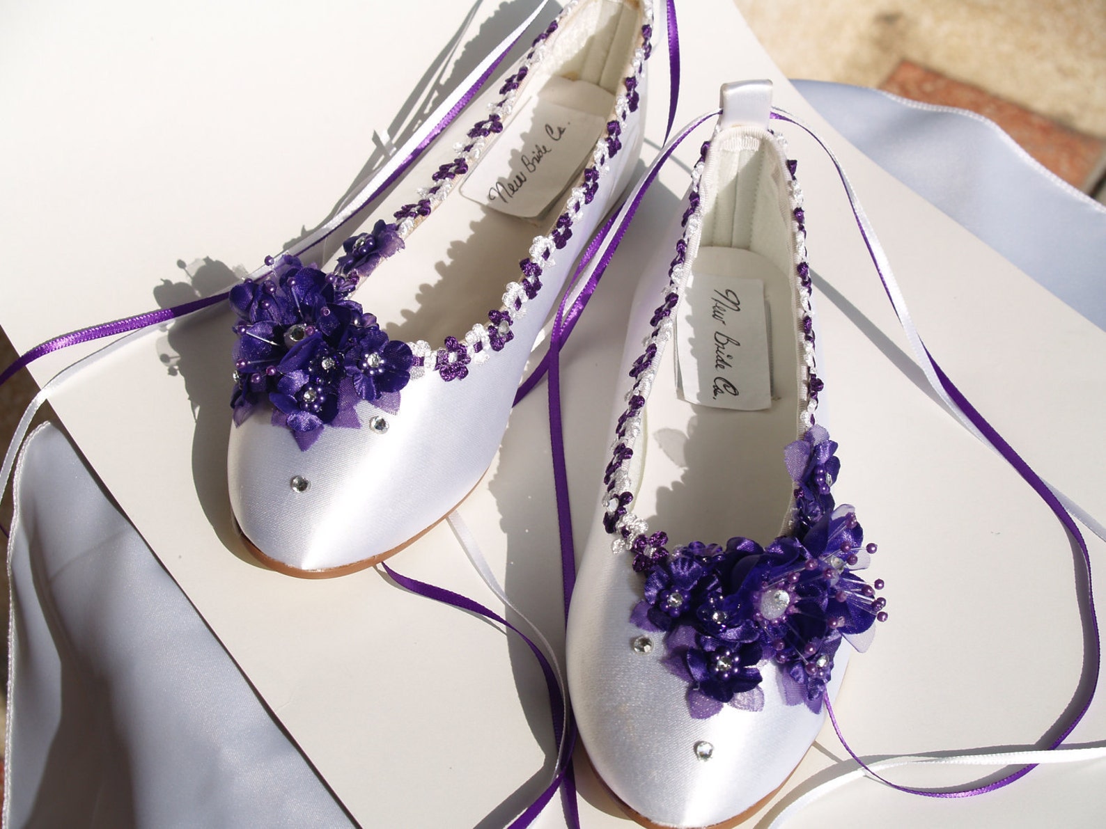 size 6 ready to ship purple silk flowers white satin flats,pearls,crystals, lace up ribbon,satin ballet style slippers,closed to