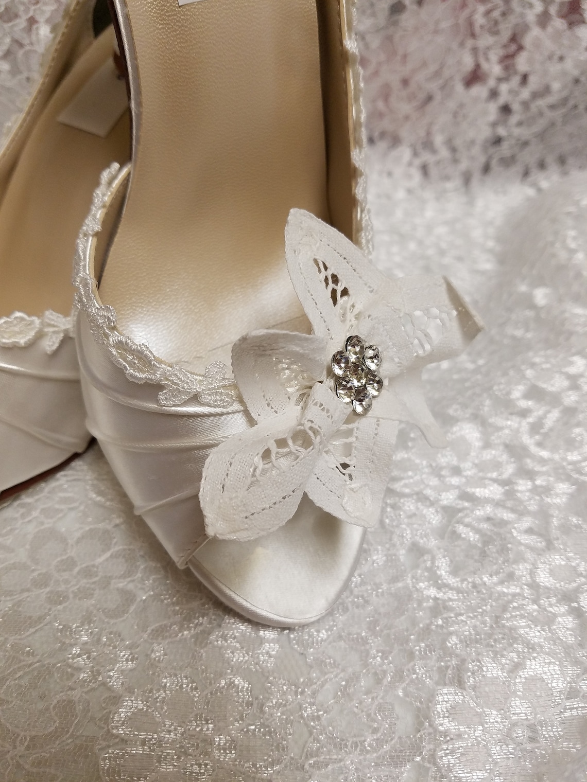 white bow wedding shoes
