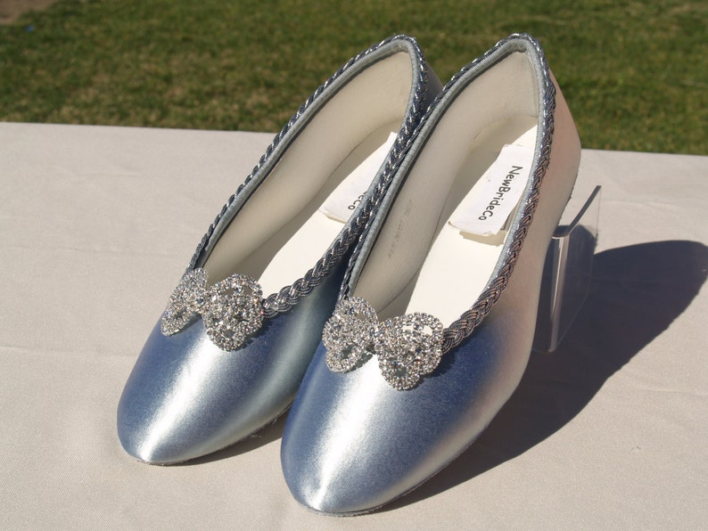 silver flats with bow