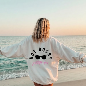 Not Bossy sunglasses graphic crewneck sweatshirt | feminist slogan, pink script