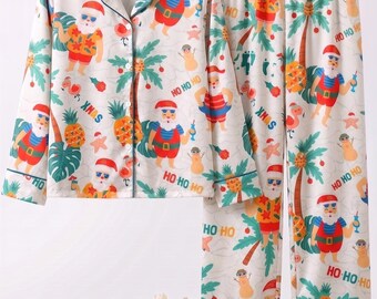 Conjunto de pijama unisex de satén con estampado tropical de Papá Noel.