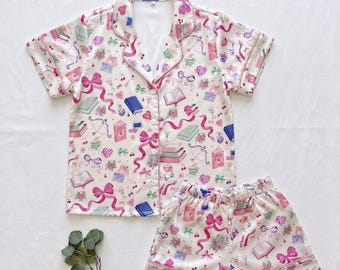 Conjunto de pijama de satén con estampado de libros y lazos, pijama de manga corta, ropa de estar por casa de seda rosa.