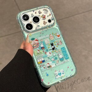 Puede incluir: Funda transparente para tel&eacute;fono con fondo verde menta brillante y pegatinas de personajes de dibujos animados. Las pegatinas incluyen conejitos, Hello Kitty y otras ilustraciones bonitas. La funda tiene un parachoques protector alrededor de la c&aacute;mara.
