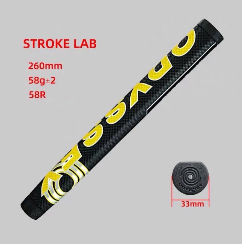 K&ouml;nnte beinhalten: Schwarzer Golfschl&auml;gergriff mit gelbem "ODYSSEY" und "STROKE LAB" Schriftzug. Der Griff ist 260 mm lang und wiegt 58 g. Eine schwarze Endkappe mit 33 mm ist ebenfalls abgebildet.