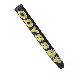K&ouml;nnte beinhalten: Schwarzer Golfschl&auml;gergriff mit dem Wort "ODYSSEY" in gro&szlig;en gelben Buchstaben. Der Griff hat auch ein gelb-wei&szlig;es Design am unteren Ende. Der Griff ist f&uuml;r einen komfortablen und sicheren Halt f&uuml;r Golfer konzipiert, ca. 27 cm lang.