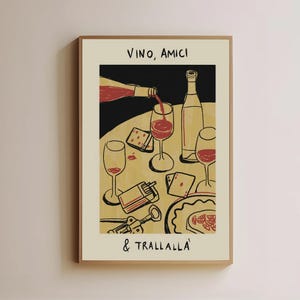 May include: A framed art print featuring a wine-themed illustration. The artwork depicts a bottle pouring red wine into a glass, with additional glasses, a bottle, playing cards, and cigarettes. The text "VINO, AMICI & TRALLALLA" is at the top and bottom.