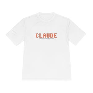 May include: White t-shirt featuring the name "CLAUDE" in pixelated orange lettering. Beneath the name is the text "-dangerouslySkipPermissions". The shirt has a crew neck and short sleeves.