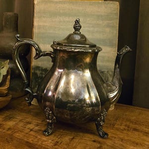 Vintage Silverplate Teapot | Floral Repoussé Rim | Flower Finial | Footed | Dark Tarnish Patina