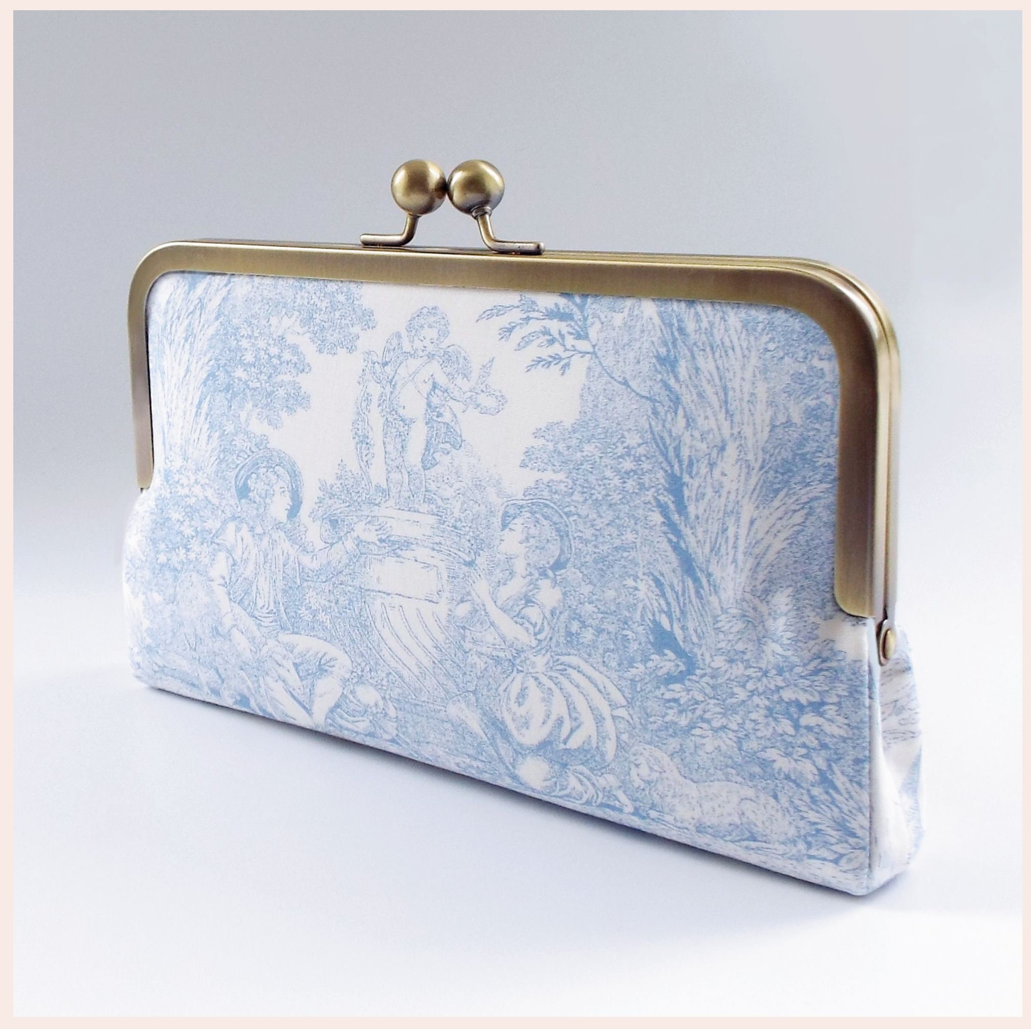 Embellished denim clutch bag in blue - Roger Vivier | Mytheresa