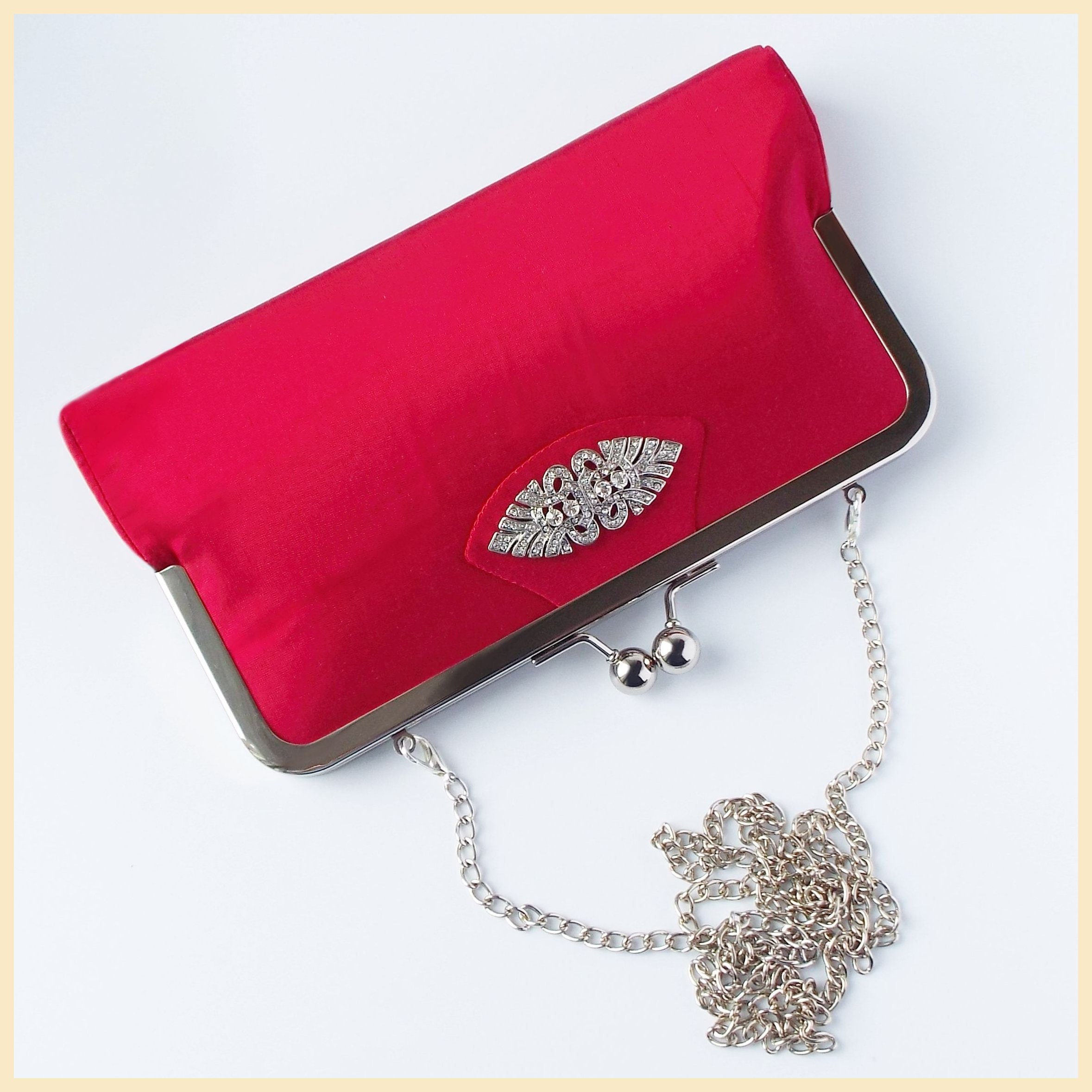 red clutch bag with chain