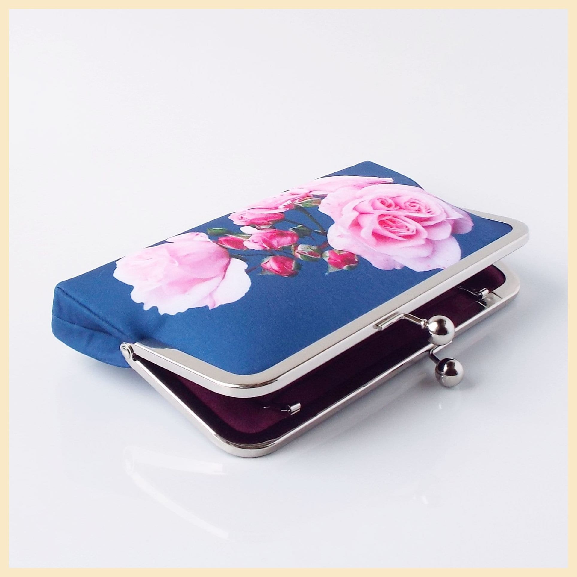 Navy floral sale clutch bag