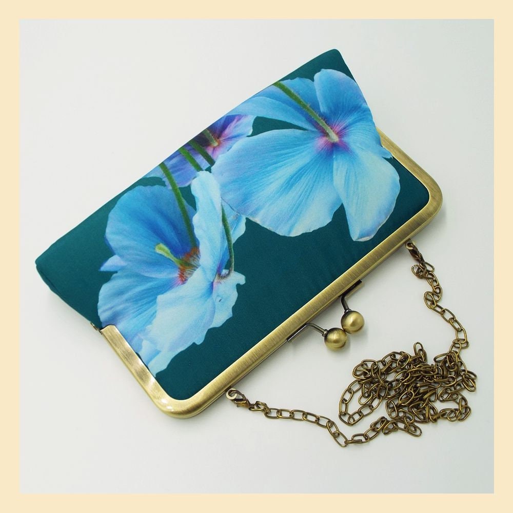 blue and green clutch bag