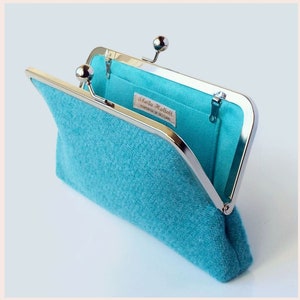 pale teal green clutch bag in Harris Tweed wool fabric with silver tone kisslock frame