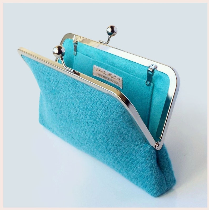 pale teal green clutch bag in Harris Tweed wool fabric with silver tone kisslock frame