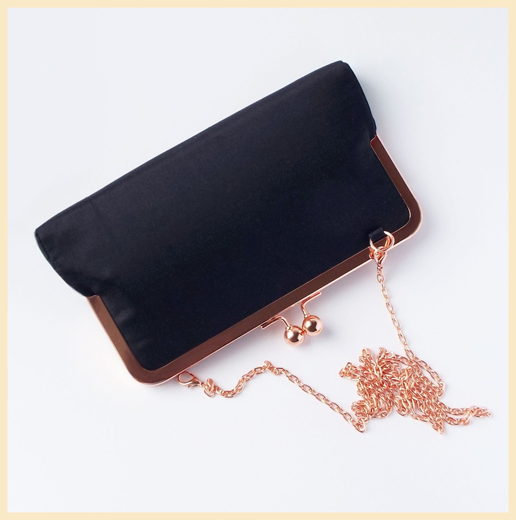 Black and rose gold top bag