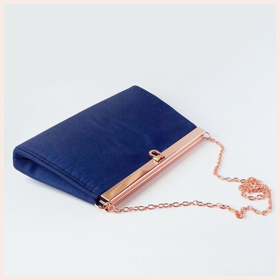 small gold clutch bag