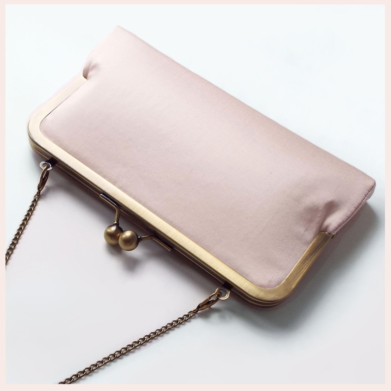 pale pink wedding clutch bag with Antique Brass tone kisslock frame and chain