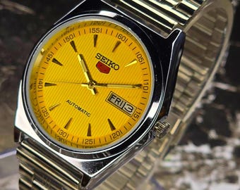 Klasyczny automatyczny zegarek Seiko 5, żółta tarcza, pasek ze stali nierdzewnej