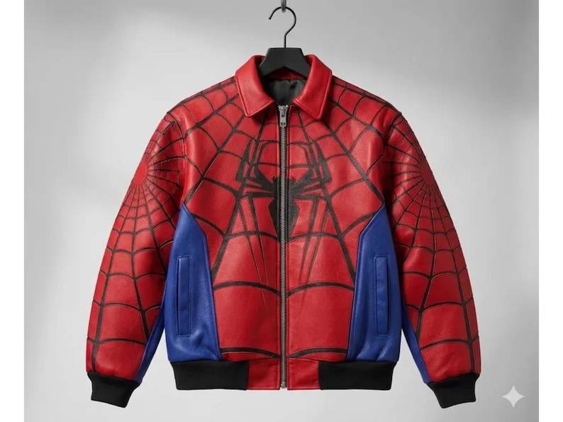 May include: Red and black leather jacket with a Spider-Man design. The jacket features a full-zip closure, blue side panels, and black ribbed cuffs and hem. The design includes a spiderweb pattern and a spider emblem on the chest.