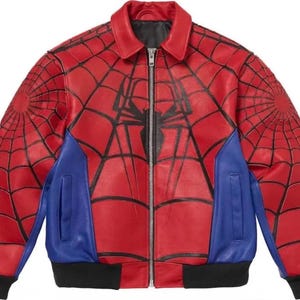 May include: Red leather jacket with a black spiderweb design on the sleeves and back, and a large spider emblem on the chest. Features blue panels on the sides and a black collar, cuffs, and hem. The jacket has a zipper closure.
