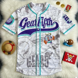 May include: A set of three ceramic mugs with a speckled, cream-colored glaze. Each mug features a different hand-painted design: a blue and green leaf, a yellow flower, and a red berry. The mugs have a simple, rounded shape.