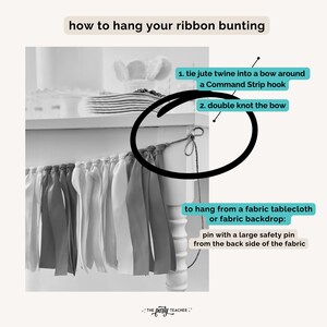 May include: A black and white photo showing how to hang ribbon bunting. The image shows a close-up of a white table with a ribbon bunting hanging from it. The text in the image reads: "how to hang your ribbon bunting", "1. tie jute twine into a bow around a Command Strip hook", "2. double knot the bow", "to hang from a fabric tablecloth or fabric backdrop: pin with a large safety pin from the back side of the fabric", ": THE party TEACHER :"
