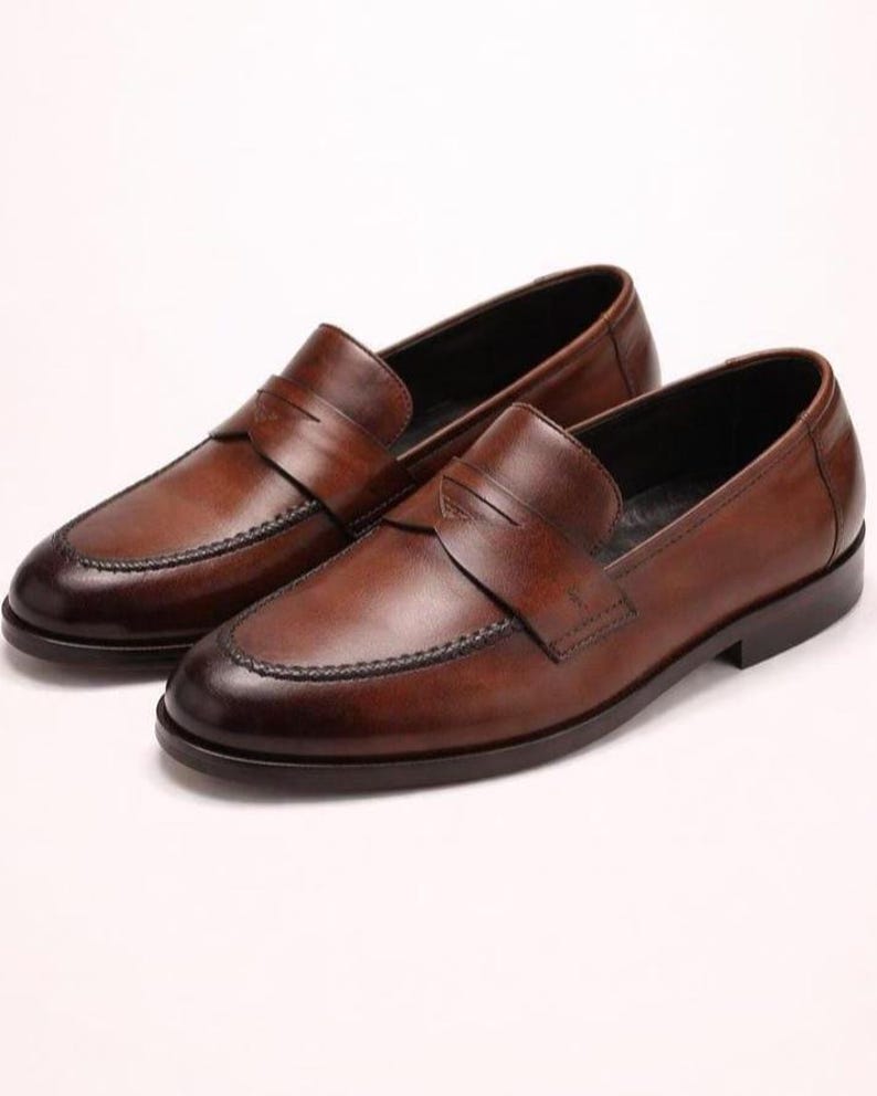 Men’s handmade penny loafers crafted from genuine leather with elegant dress shoe design