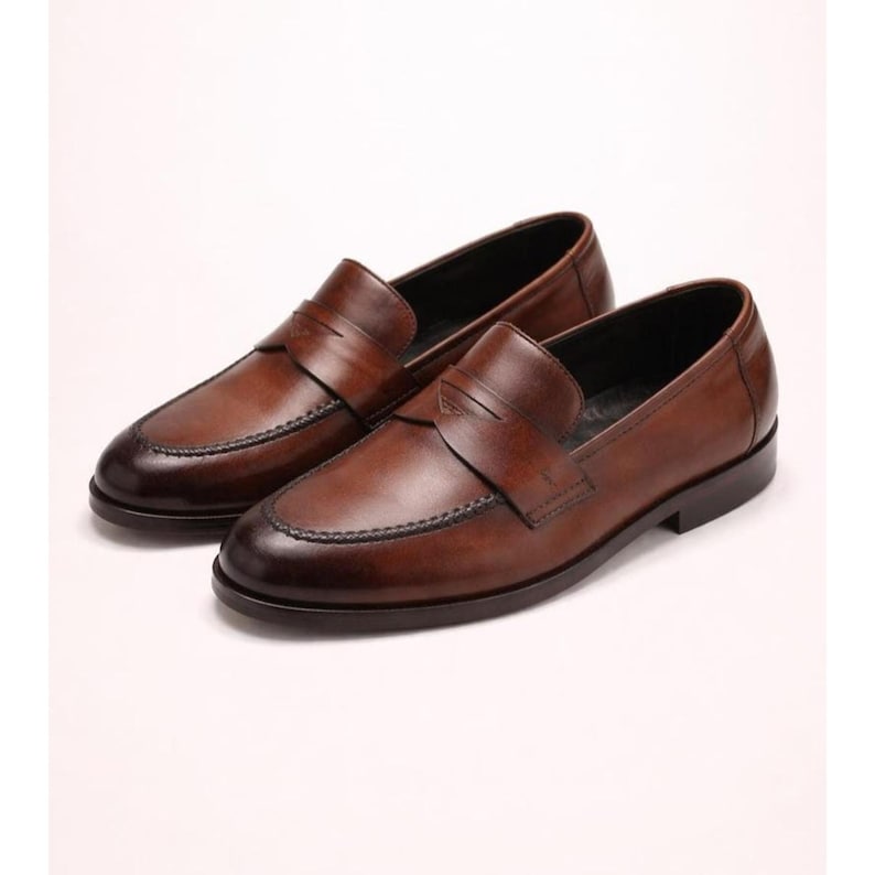 Men’s handmade penny loafers crafted from genuine leather with elegant dress shoe design