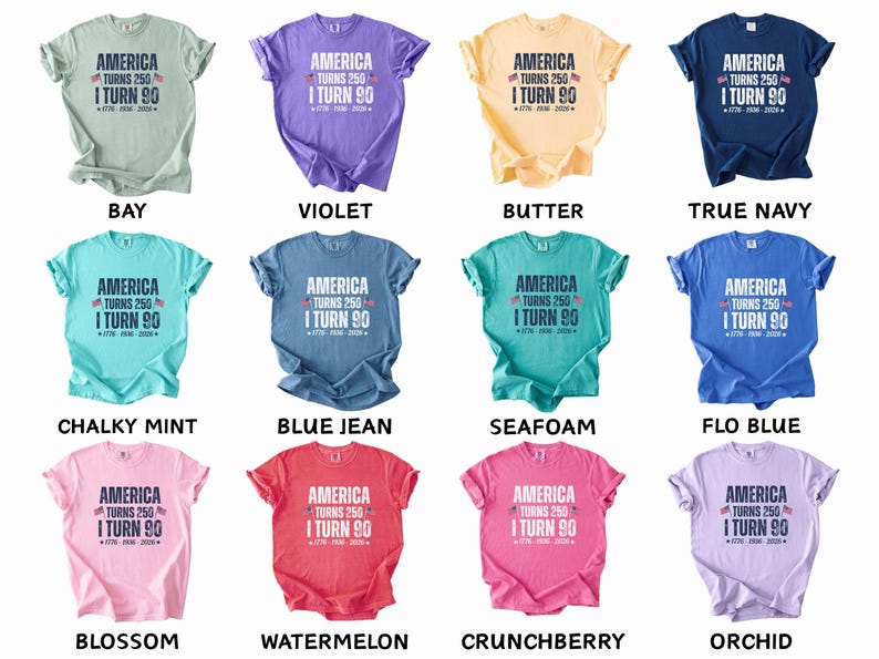 May include: A collection of twelve short-sleeved t-shirts in various colors, each featuring the text "AMERICA TURNS 250 I TURN 90" in a bold, patriotic design. The shirts are available in shades like bay, violet, butter, and true navy.