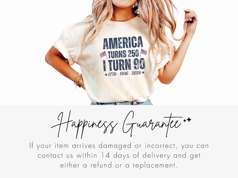 May include: Cream-colored t-shirt with the text "AMERICA TURNS 250 / I TURN 90" in navy blue, with two small American flags. The shirt also includes the years 1776-1936-2026. The shirt is a casual style.