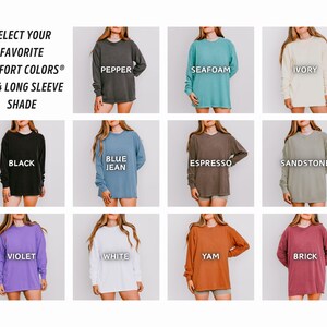 May include: A selection of long-sleeve shirts in various colors, including black, blue, and white. The image displays the Comfort Colors 6014 Long Sleeve Shade collection, with each shirt labeled with its color name. The text "SELECT YOUR FAVORITE COMFORT COLORS&reg;" is at the top.