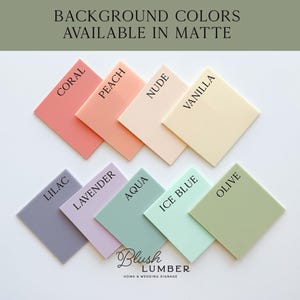 May include: A collection of matte finish color samples in coral, peach, nude, vanilla, lilac, lavender, aqua, ice blue, and olive. Each square has a color name printed on it. The text "BACKGROUND COLORS AVAILABLE IN MATTE" is at the top.