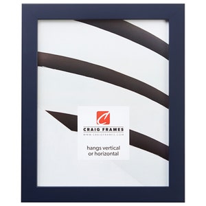 May include: A navy blue picture frame with a white mat. The frame is made of wood and has a simple design. It hangs vertically or horizontally. "Craig Frames" and "www.craigframes.com" are printed on the mat.