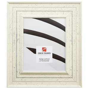 May include: White picture frame with a distressed finish. The frame has a double mat and a beveled edge. The frame is made of wood and has a whitewash finish. The frame is 11x14 inches and can be hung vertically or horizontally. "Craig Frames" is printed on the frame.