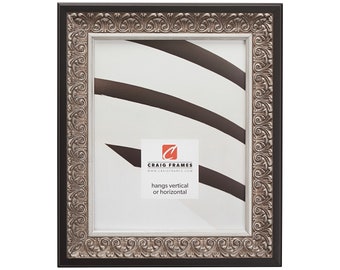 May include: Black picture frame with a silver ornate border. The frame has a white mat and hangs vertically or horizontally. The frame is made by Craig Frames.
