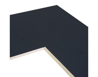 May include: A black mount board with a white core, showing the edge of the board.