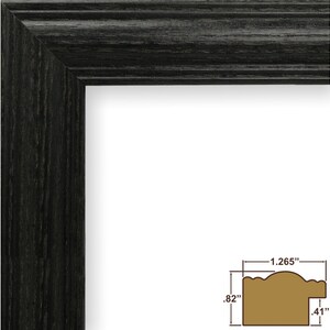 May include: Black wood picture frame with a simple, slightly rounded profile. The frame measures 1.265 inches wide, 0.82 inches tall, and 0.41 inches deep.