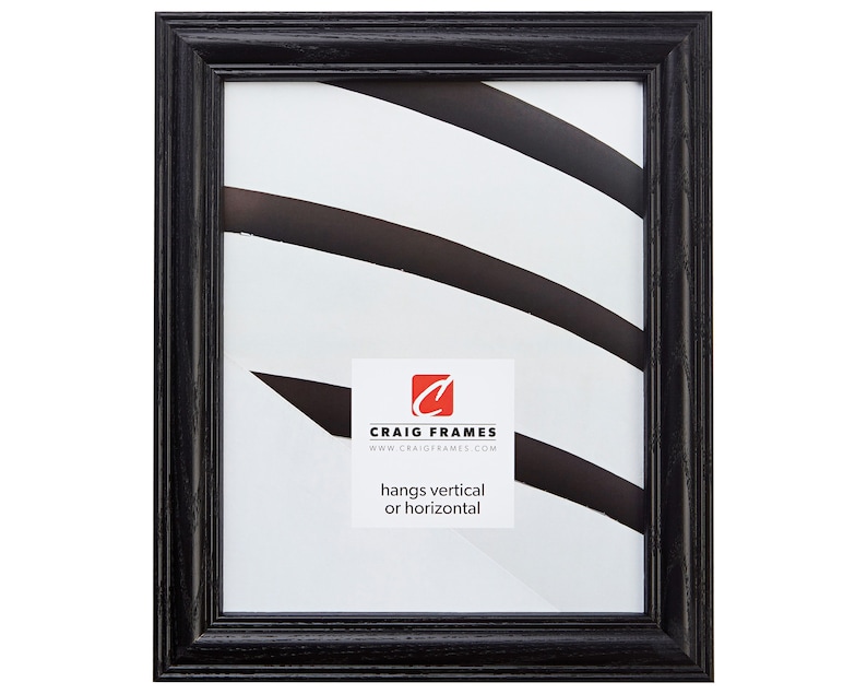 May include: Black wood picture frame with a simple, slightly raised edge. The frame is ready to hang vertically or horizontally. The text on the frame reads "Craig Frames" and "www.craigframes.com".