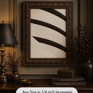 May include: Framed art print with a cream background and three bold, black curved lines. The ornate, dark brown frame surrounds the artwork. The text at the bottom says "Any Size in 1/4 inch Increments up to 30" x 40".