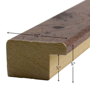 May include: Close-up of a wood picture frame with a brown and beige finish. The frame is 1 1/4 inches wide and 3/4 inches deep.