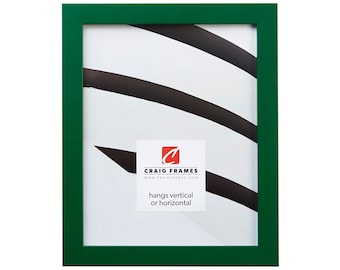 May include: A green picture frame with a white mat and a white background. The frame is made of wood and has a simple design. The frame is 11x14 inches and can be hung vertically or horizontally. Craig Frames www.craigframes.com