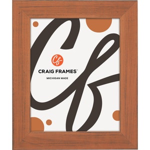 May include: A rustic wood picture frame with a distressed orange finish. The frame has a simple design with a beveled edge. The frame is made in Michigan by Craig Frames.