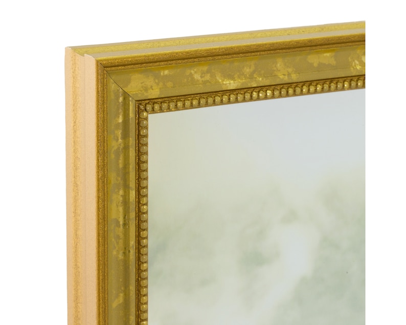 May include: A gold-colored framed mirror with a beaded border. The frame has a distressed finish.