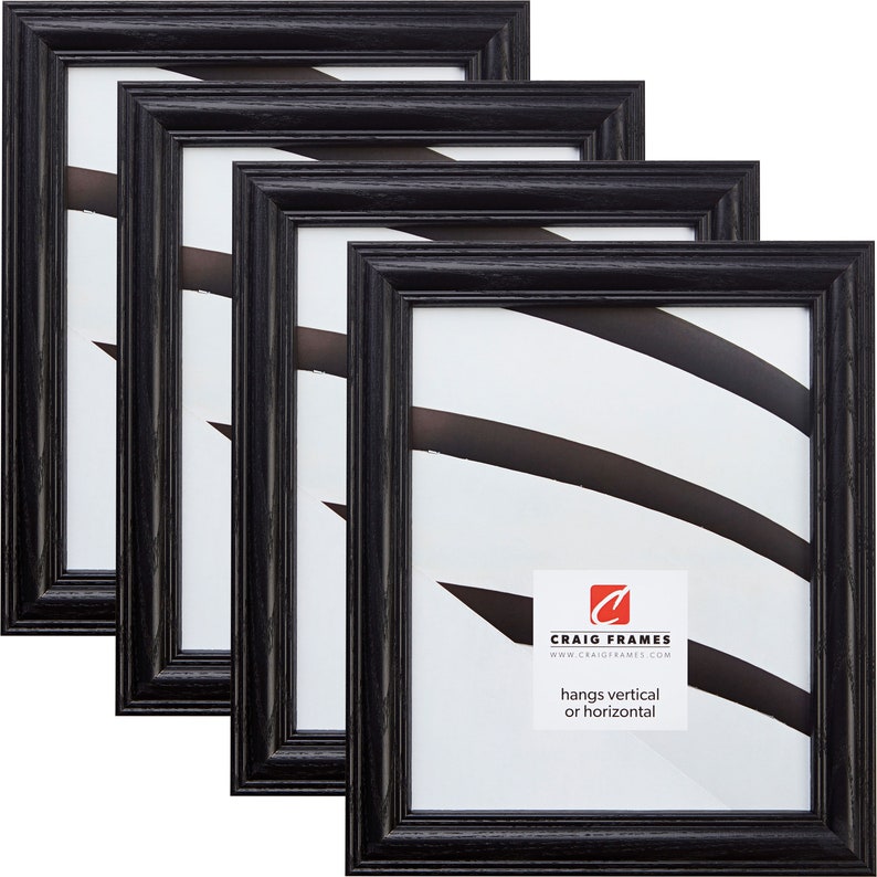 May include: Set of four black wood picture frames with a simple, classic design. Each frame hangs vertically or horizontally. The frames are made of wood with a black finish. The frames are 8x10 inches in size.