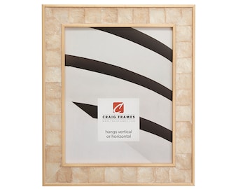 May include: A beige picture frame with a gold inner border and a white mother of pearl outer border. The frame is made of wood and has a matte finish. The frame is designed to hang vertically or horizontally. The text "CRAIG FRAMES" and "www.craigframes.com" is printed on the frame.