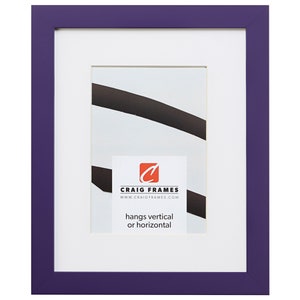 May include: A purple picture frame with a white mat and a white backing board. The frame is made of wood and has a smooth finish. The frame is 11x14 inches and can be hung vertically or horizontally. The frame is made by Craig Frames.