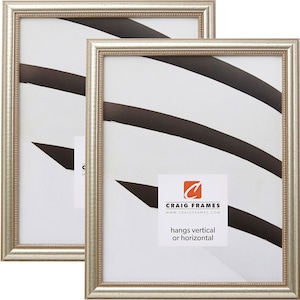 May include: Two silver picture frames with a beaded edge. The frames are empty and ready to display photos or artwork. The frames can be hung vertically or horizontally.