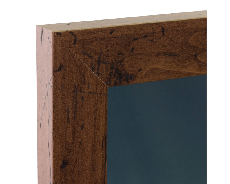 May include: A dark brown wooden picture frame with a dark blue mat. The frame has a rustic, distressed look.
