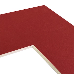 May include: A close-up of the corner of a red mount board with a white core. The mount board is textured and has a slight sheen.