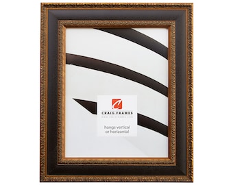 May include: Ornate black picture frame with gold trim. The frame has a detailed, textured design around the edges. A white label in the bottom center reads "Craig Frames" and "hangs vertical or horizontal."